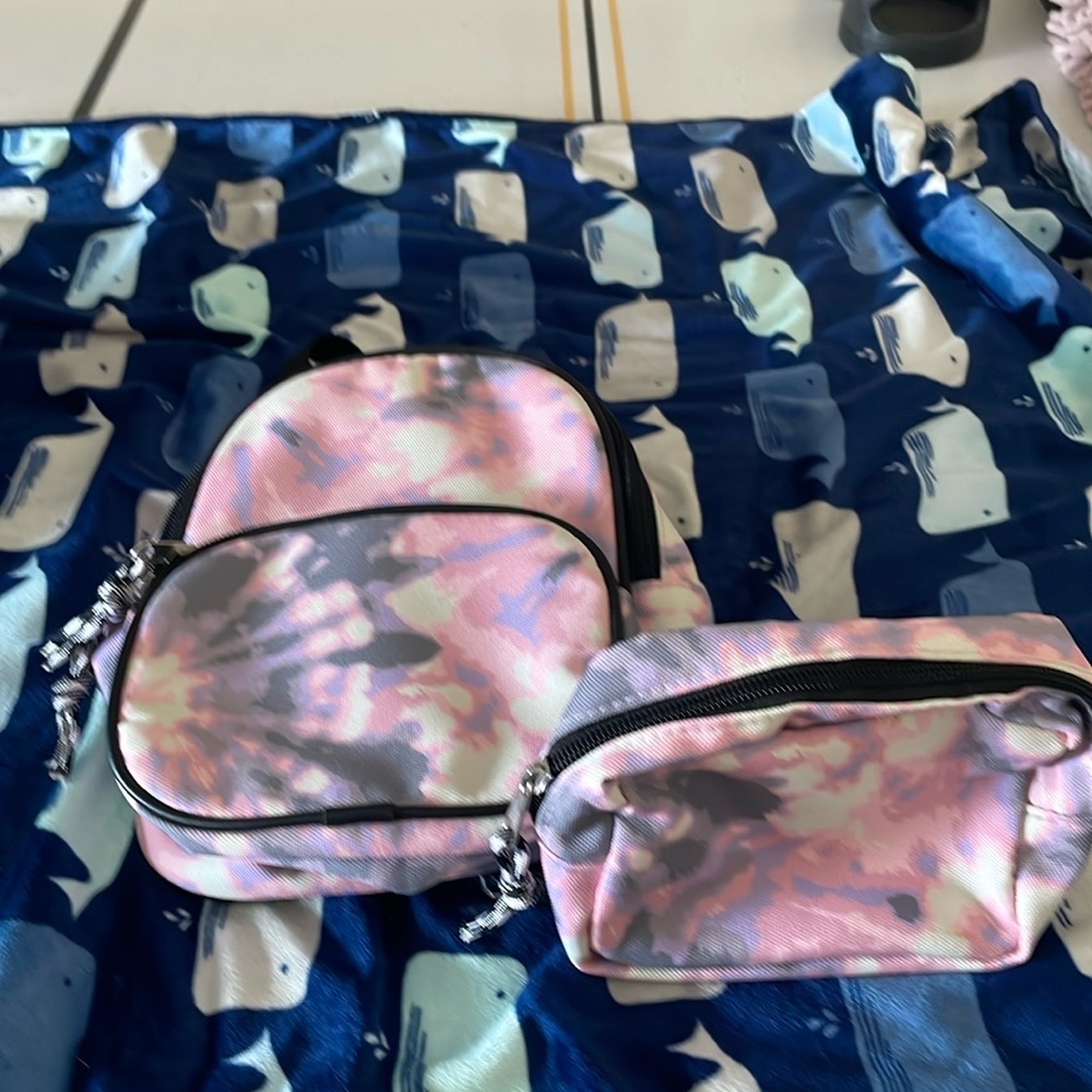 Pink and purple, tie-dye backpack plus make up pouch